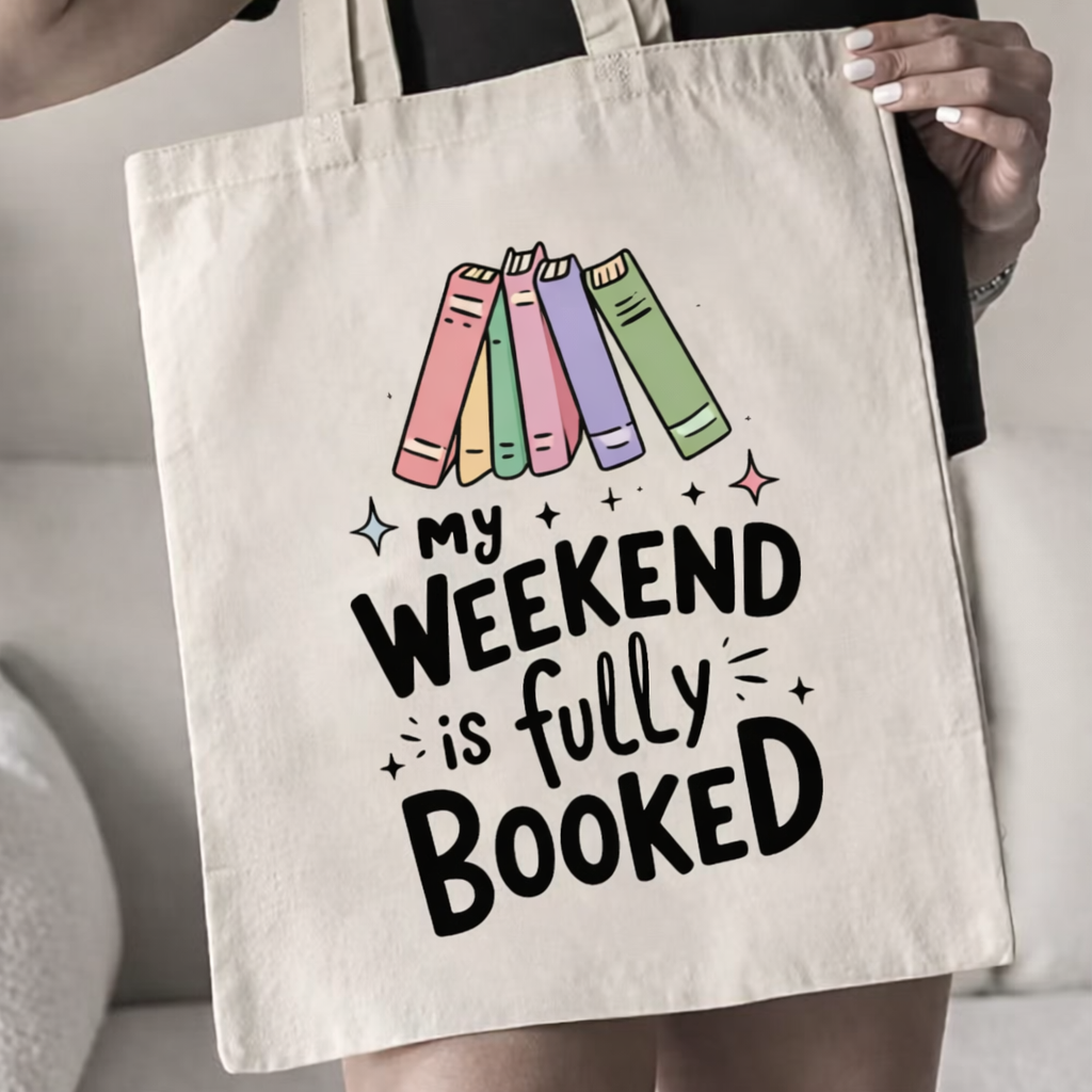 Tote bag with colorful books and 'My weekend is fully booked' text