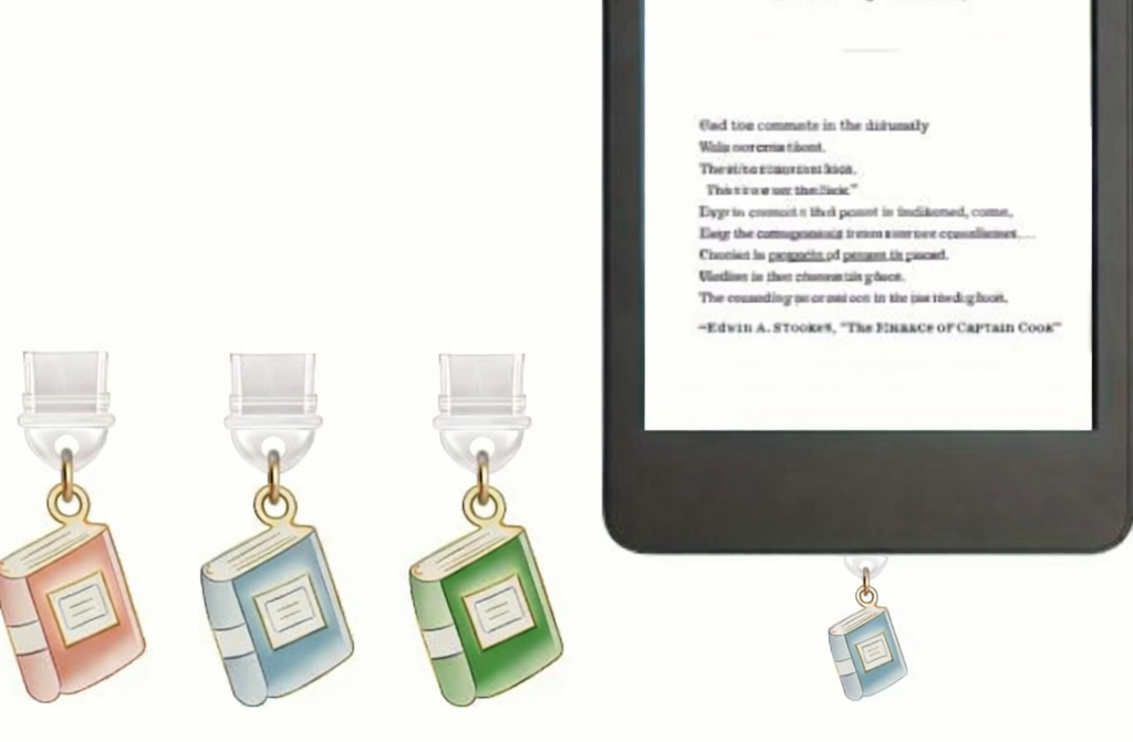 Colorful book-shaped e-reader holders with a digital device displaying text.